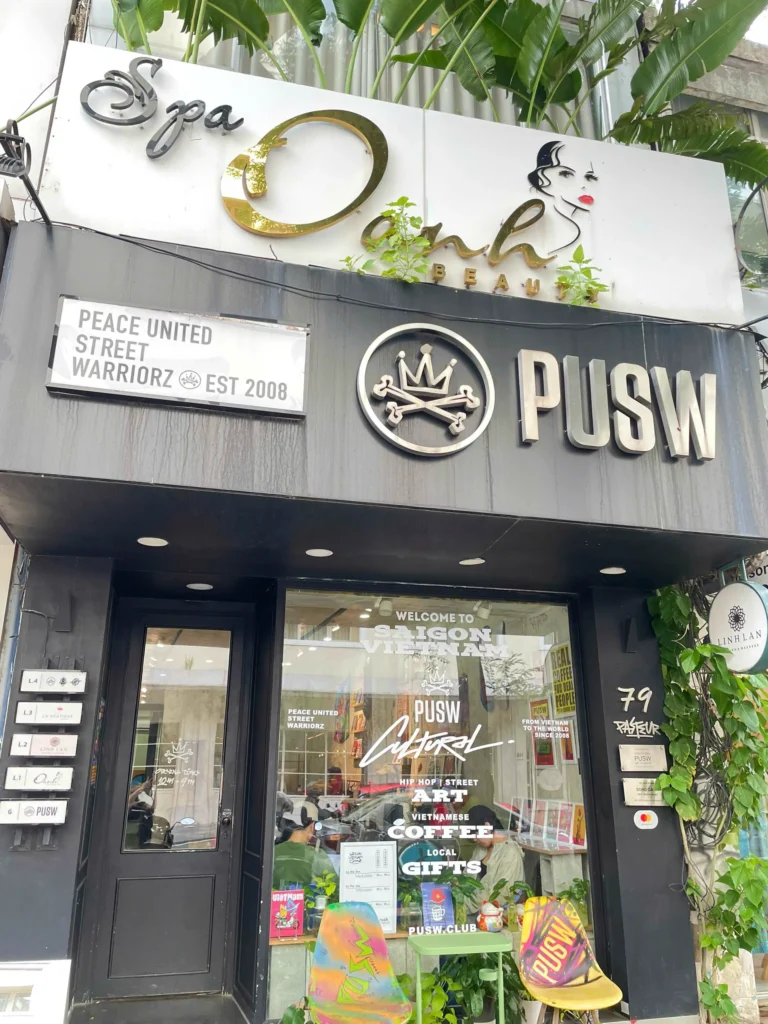 Entrance of the building at 79 Pasteur with the PUSW sign, where Linh Lan Waxing is